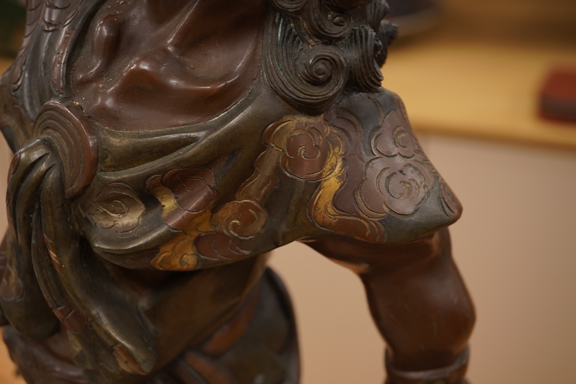 A Japanese bronze model of an oni, Meiji period, now mounted as a lamp, 50cm